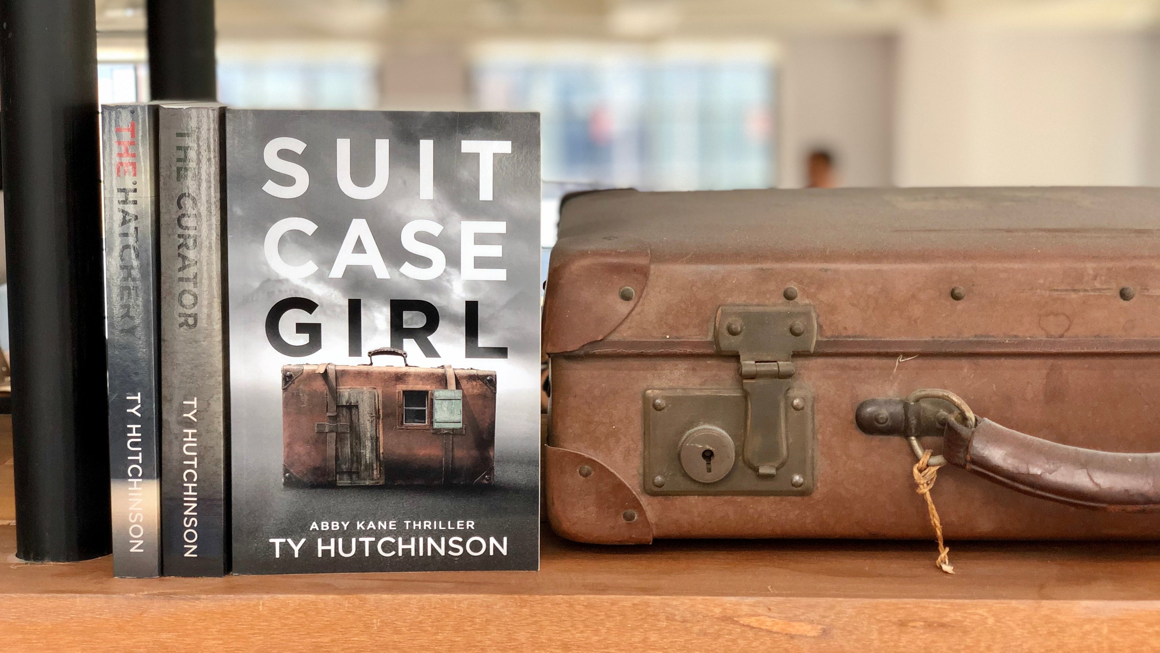 suitcase girl thriller by ty hutchinson